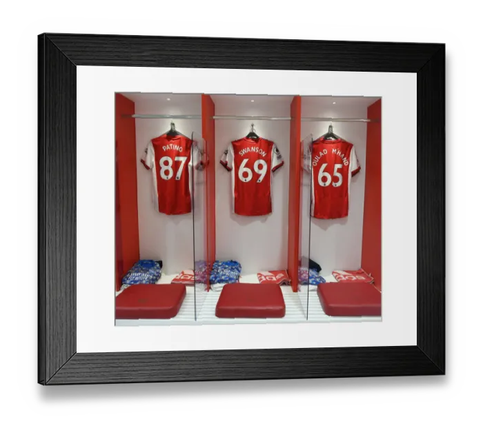 Framed Print : Arsenal Changing Room: Patino, Swanson, and Salah-Eddine's Shirts Before Arsenal vs. Leeds United (2021-22)
