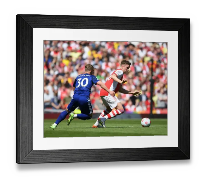 Framed Print : Arsenal's Rob Holding Outmuscles Leeds Joel Gelhardt in Intense Premier League Clash