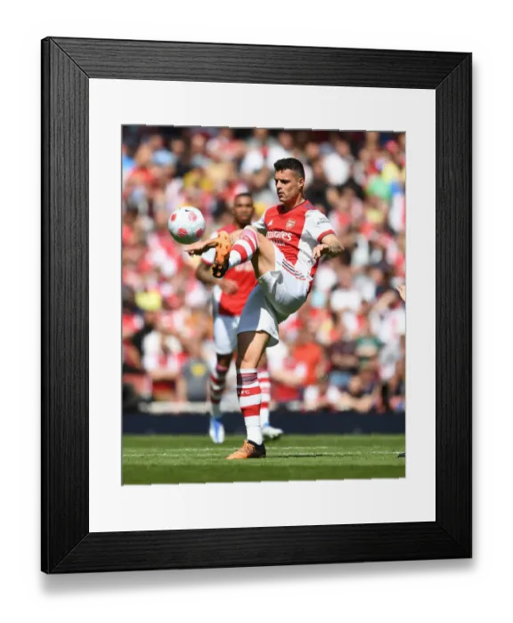 Framed Print : Granit Xhaka: Arsenal's Midfield Mastermind in Action against Leeds United, Premier League 2021-22