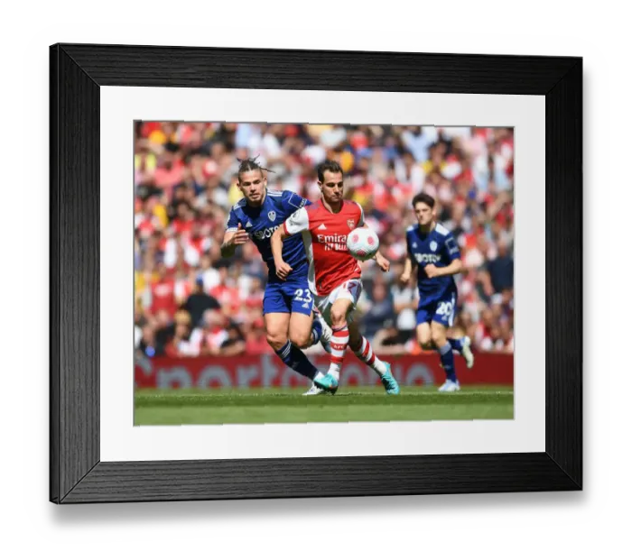Framed Print : Arsenal's Cedric Outpaces Phillips: Thrilling Moment from Arsenal vs Leeds United Premier League Clash Framed Print : Arsenal's Cedric Outpaces Phillips: Thrilling Moment from Arsenal vs Leeds United Premier League Clash