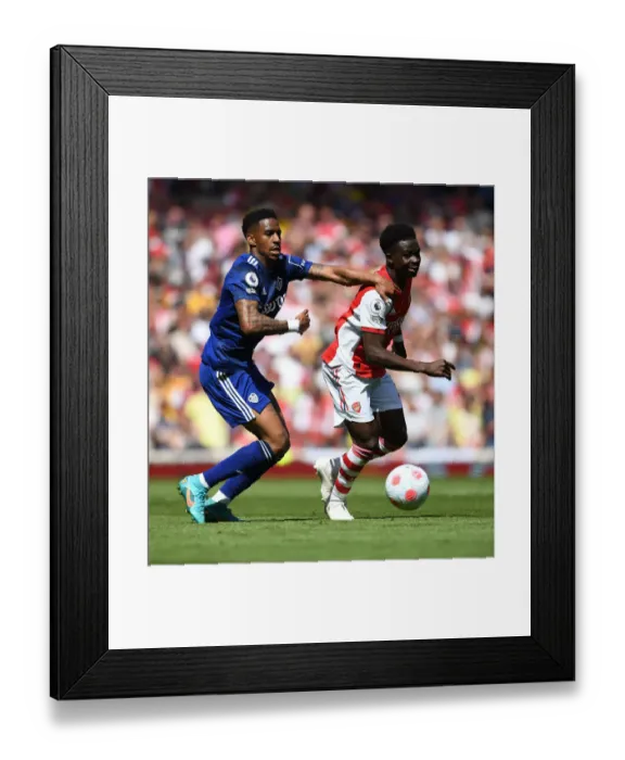 Framed Print : Saka Scores Spectacular Win: Arsenal's Star Outmaneuvers Firpo in Thrilling Premier League Clash