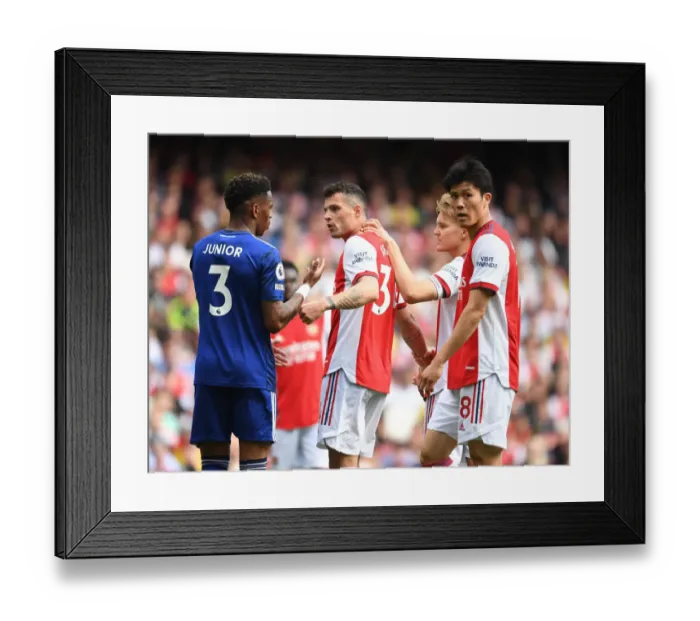 Framed Print : Clash of Titans: Xhaka vs Firpo in Arsenal's Battle against Leeds United (2021-22) Framed Print : Clash of Titans: Xhaka vs Firpo in Arsenal's Battle against Leeds United (2021-22)