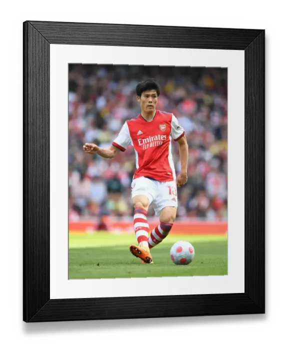 Framed Print : Arsenal's Tomiyasu in Action Against Leeds United - Premier League 2021-22 Framed Print : Arsenal's Tomiyasu in Action Against Leeds United - Premier League 2021-22