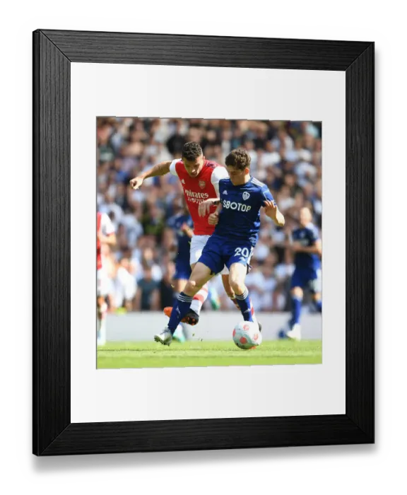 Framed Print : Arsenal vs Leeds United: Xhaka vs James Clash in Intense Premier League Showdown