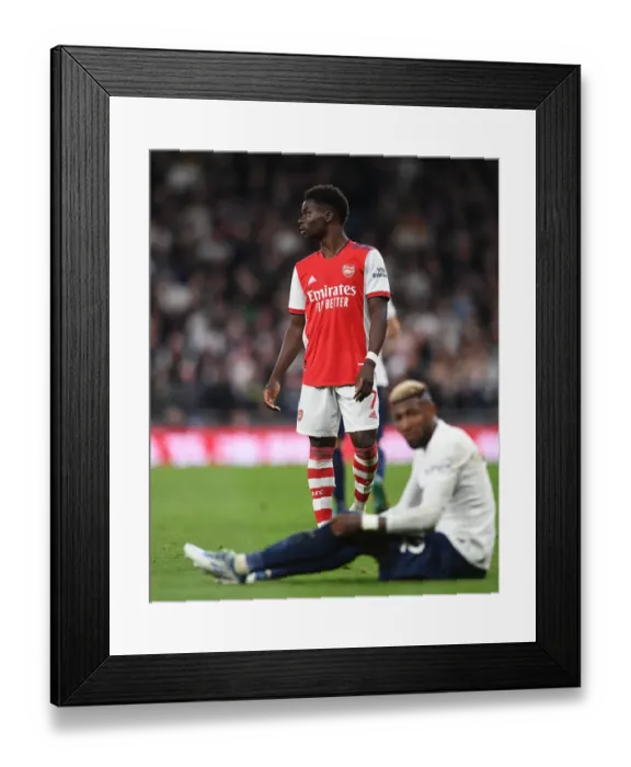 Framed Print : Bukayo Saka in Action: Tottenham vs. Arsenal, Premier League 2021-22 Framed Print : Bukayo Saka in Action: Tottenham vs. Arsenal, Premier League 2021-22