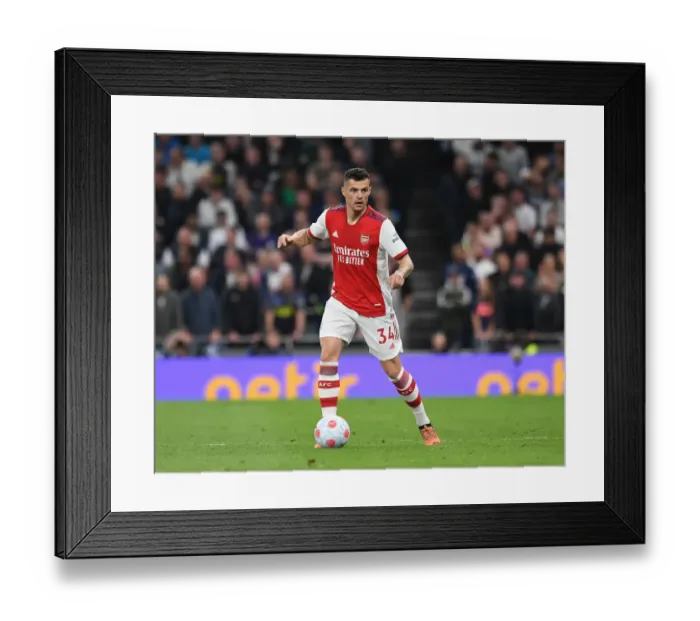 Framed Print : Granit Xhaka: Intense Rivalry - Arsenal vs. Tottenham Hotspur, Premier League 2021-22 Framed Print : Granit Xhaka: Intense Rivalry - Arsenal vs. Tottenham Hotspur, Premier League 2021-22
