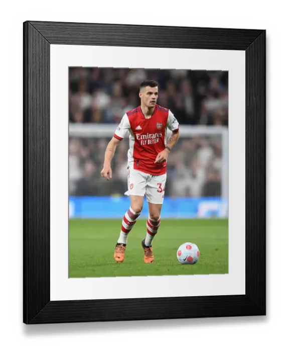 Framed Print : Granit Xhaka: Battle in the Heart of Arsenal's Midfield at Tottenham vs. Arsenal, 2021-22 Premier League Framed Print : Granit Xhaka: Battle in the Heart of Arsenal's Midfield at Tottenham vs. Arsenal, 2021-22 Premier League