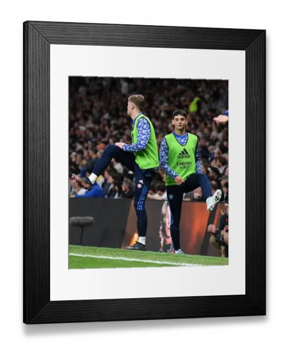 Framed Print : Arsenal Players Zak Swanson and Charlie Patino Warm Up Ahead of Tottenham Showdown - Premier League 2021-22 Framed Print : Arsenal Players Zak Swanson and Charlie Patino Warm Up Ahead of Tottenham Showdown - Premier League 2021-22
