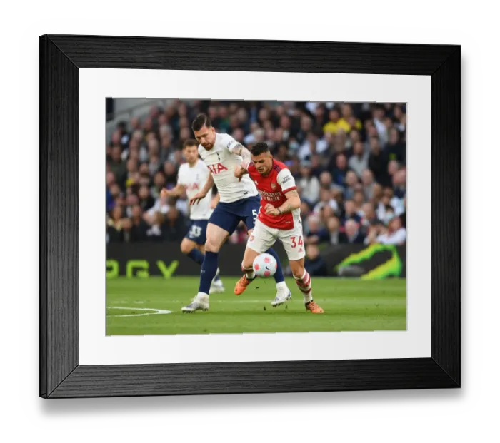 Framed Print : Xhaka vs Hojbjerg: Intense Battle in the Premier League Clash Between Tottenham and Arsenal (2021-22)