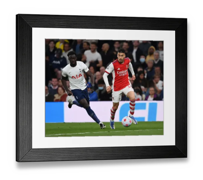 Framed Print : Martinelli Outsmarts Sanchez: Thrilling Arsenal Win Against Tottenham in Premier League 2021-22