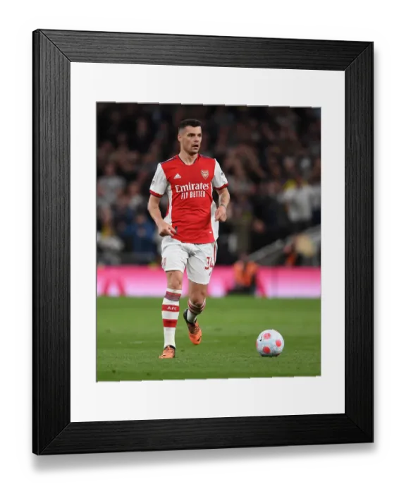 Framed Print : Granit Xhaka in Action: Arsenal vs. Tottenham Hotspur, Premier League 2021-22