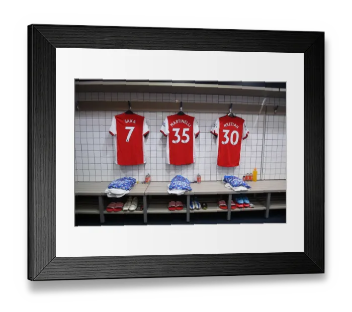 Framed Print : Arsenal Changing Room: Bukayo Saka, Gabriel Martinelli, and Eddie Nketiah's Shirts Before Tottenham Match, 2021-22 Premier League