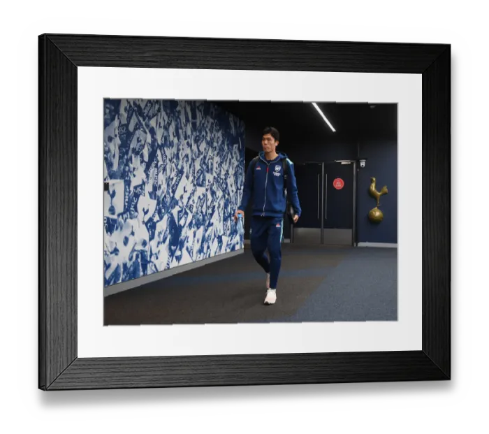 Framed Print : Tomiyasu vs. Tottenham: Arsenal's Defender Clashes with Rivals in Premier League Battle Framed Print : Tomiyasu vs. Tottenham: Arsenal's Defender Clashes with Rivals in Premier League Battle