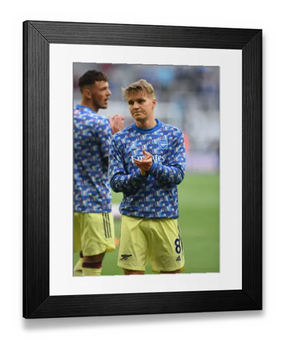 Framed Print : Arsenal's Martin Odegaard Gears Up for Newcastle United Clash in Premier League