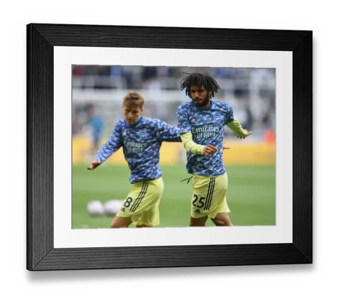 Framed Print : Arsenal's Mohamed Elneny Prepares for Newcastle United Clash in Premier League (Newcastle United vs Arsenal, 2021-22) Framed Print : Arsenal's Mohamed Elneny Prepares for Newcastle United Clash in Premier League (Newcastle United vs Arsenal, 2021-22)