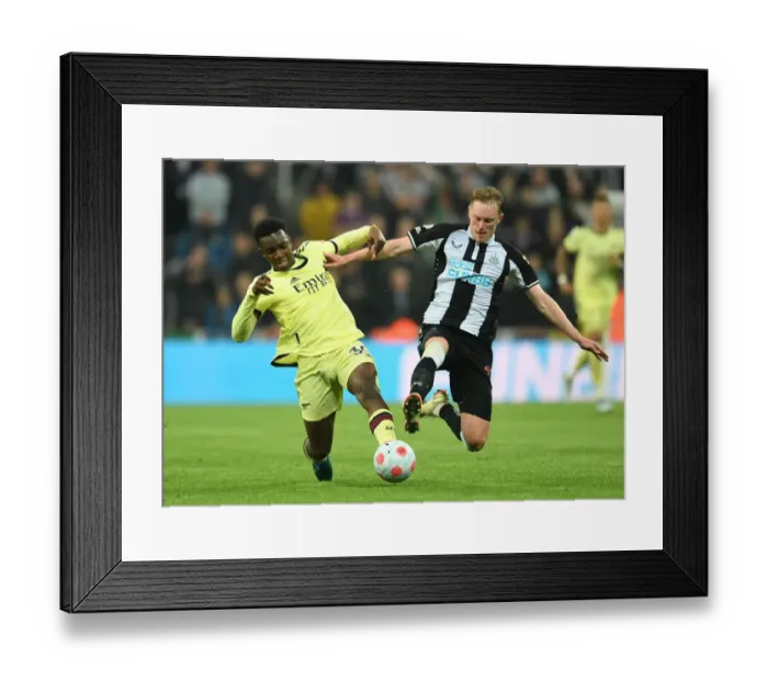 Framed Print : Newcastle vs Arsenal: Nketiah vs Longstaff Clash in Premier League Showdown Framed Print : Newcastle vs Arsenal: Nketiah vs Longstaff Clash in Premier League Showdown