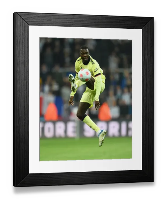 Framed Print : Pepe in Action: Arsenal vs. Newcastle United, Premier League 2021-22 Framed Print : Pepe in Action: Arsenal vs. Newcastle United, Premier League 2021-22