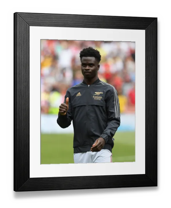 Framed Print : Arsenal's Bukayo Saka Gears Up for Arsenal v Everton Clash in Premier League (2021-22)