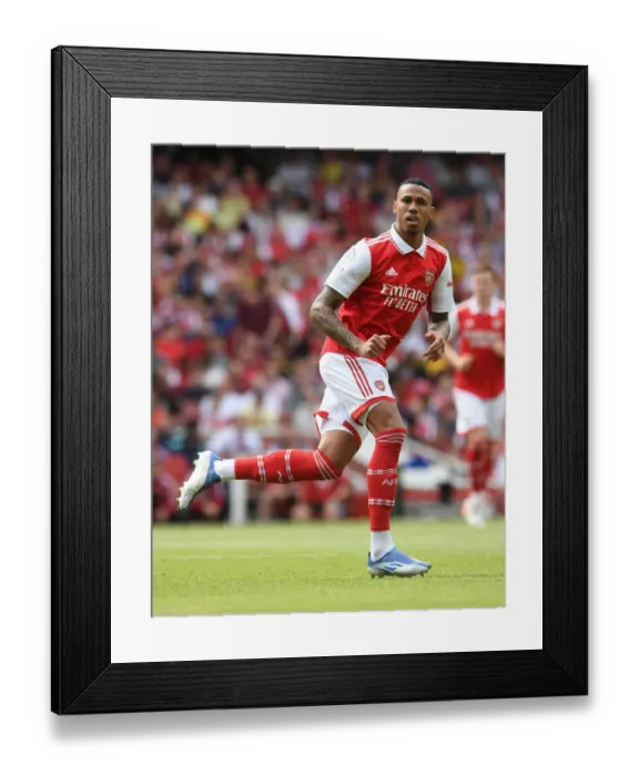 Framed Print : Gabriel Magalhaes Focuses in Arsenal's Battle Against Everton (2021-22)