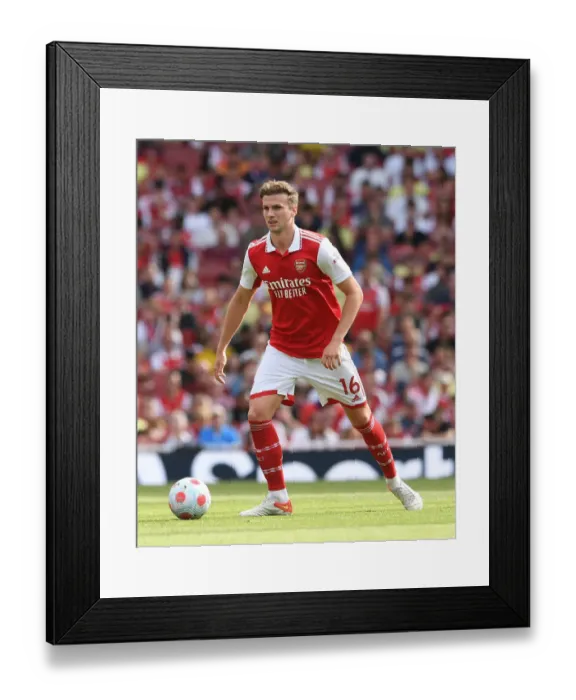 Framed Print : Arsenal's Rob Holding in Action: Premier League Clash between Arsenal and Everton (2021-22)