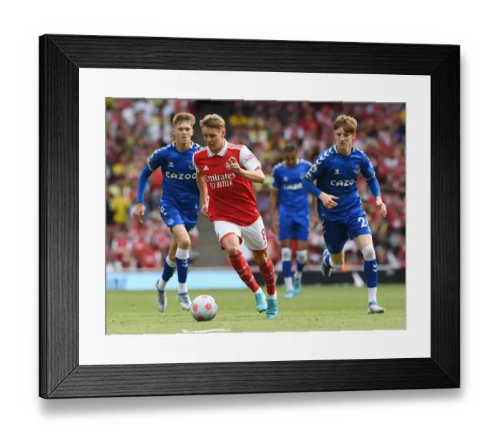 Framed Print : Arsenal vs. Everton: Martin Odegaard Clashes with Anthony Gordon in Premier League Showdown (2021-22) Framed Print : Arsenal vs. Everton: Martin Odegaard Clashes with Anthony Gordon in Premier League Showdown (2021-22)