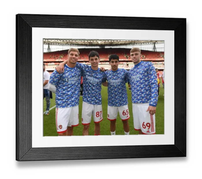 Framed Print : Arsenal's Young Stars: Emile Smith Rowe, Charlie Patino, Salah-Eddine Oulad Mhand and Zak Swanson Celebrate Victory Over Everton (Arsenal v Everton 2021-22)