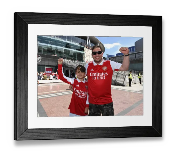 Framed Print : Arsenal Fans Donning New Shirts Before Arsenal vs. Everton, Premier League 2021-22