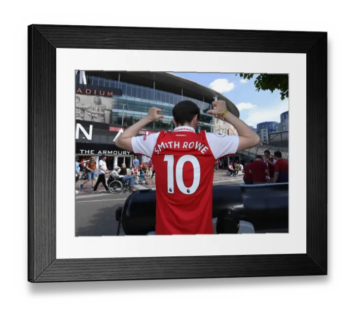 Framed Print : Arsenal Fans Donning New Shirts Ahead of Arsenal v Everton Premier League Clash at Emirates Stadium (2021-22)