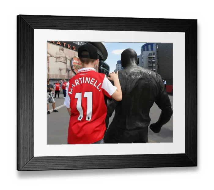 Framed Print : Arsenal Fans Donning New Shirts Ahead of Arsenal vs. Everton Premier League Clash at Emirates Stadium (2021-22) Framed Print : Arsenal Fans Donning New Shirts Ahead of Arsenal vs. Everton Premier League Clash at Emirates Stadium (2021-22)