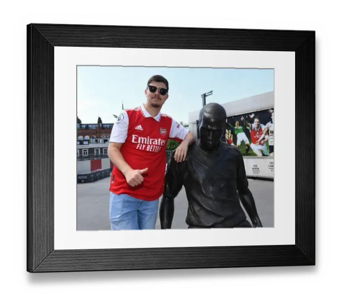 Framed Print : Arsenal Fans Showcase New Home Shirts at Emirates Stadium (2021-22) Framed Print : Arsenal Fans Showcase New Home Shirts at Emirates Stadium (2021-22)