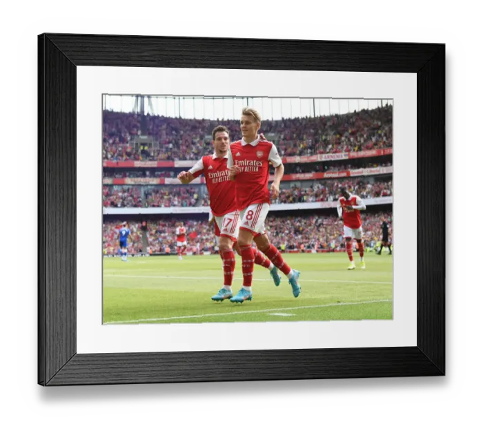 Framed Print : Arsenal's Victory Celebration: Martin Odegaard Scores Fifth Goal vs. Everton (2021-22)