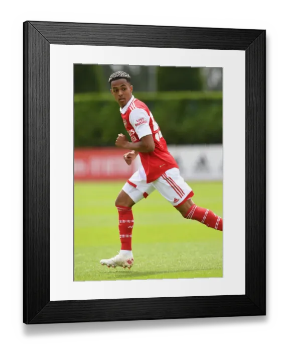 Framed Print : Omari Hutchinson Shines: Arsenal's Pre-Season Star Against Ipswich Town