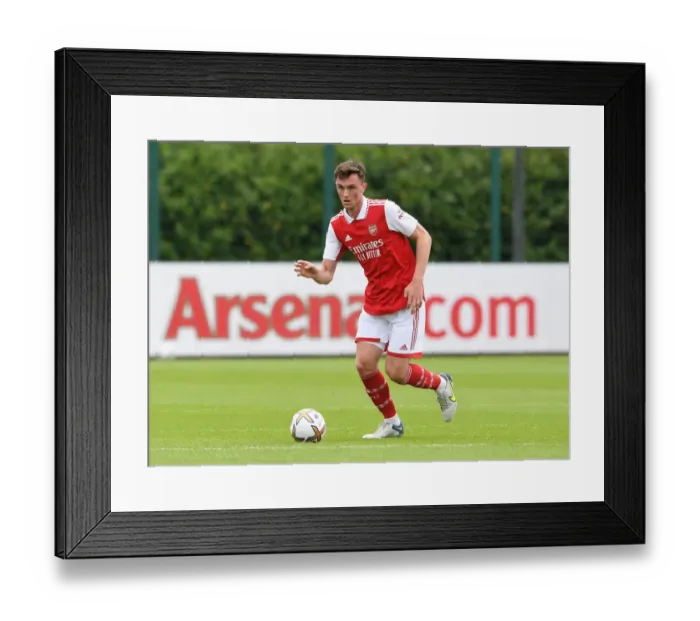 Framed Print : Arsenal's Alex Kirk Gears Up for Pre-Season Friendly Against Ipswich Town