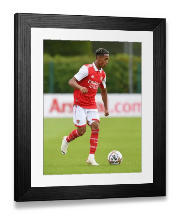 Framed Print : Arsenal's Omari Hutchinson in Action during Pre-Season Match against Ipswich Town Framed Print : Arsenal's Omari Hutchinson in Action during Pre-Season Match against Ipswich Town