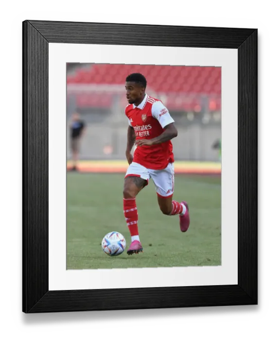 Framed Print : Arsenal's Reiss Nelson Shines in Pre-Season Match against 1. FC Nürnberg Framed Print : Arsenal's Reiss Nelson Shines in Pre-Season Match against 1. FC Nürnberg