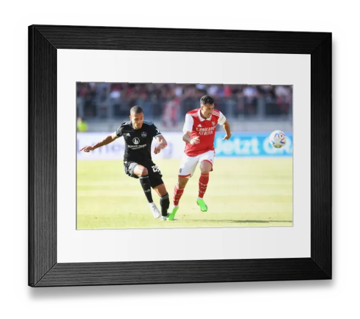 Framed Print : Arsenal's Pre-Season Clash with 1. FC Nürnberg in Germany: Martinelli in Action Framed Print : Arsenal's Pre-Season Clash with 1. FC Nürnberg in Germany: Martinelli in Action