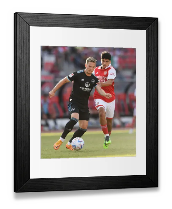 Framed Print : Arsenal FC vs. 1. FC Nurnberg: Pre-Season Clash in Nuremberg