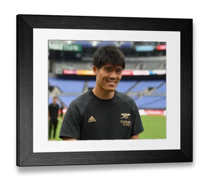 Framed Print : Arsenal's Tomiyasu Readies for Action in Arsenal v Everton Pre-Season Clash