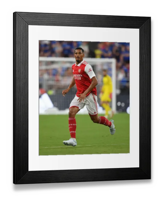 Framed Print : William Saliba Stands Out: Arsenal's Defensive Star Shines Against Everton in Pre-Season Match