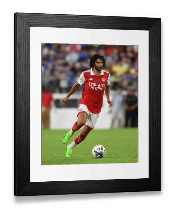 Framed Print : Arsenal FC Training in Baltimore: Mohamed Elneny in Action during Arsenal vs. Everton Pre-Season Match, 2022