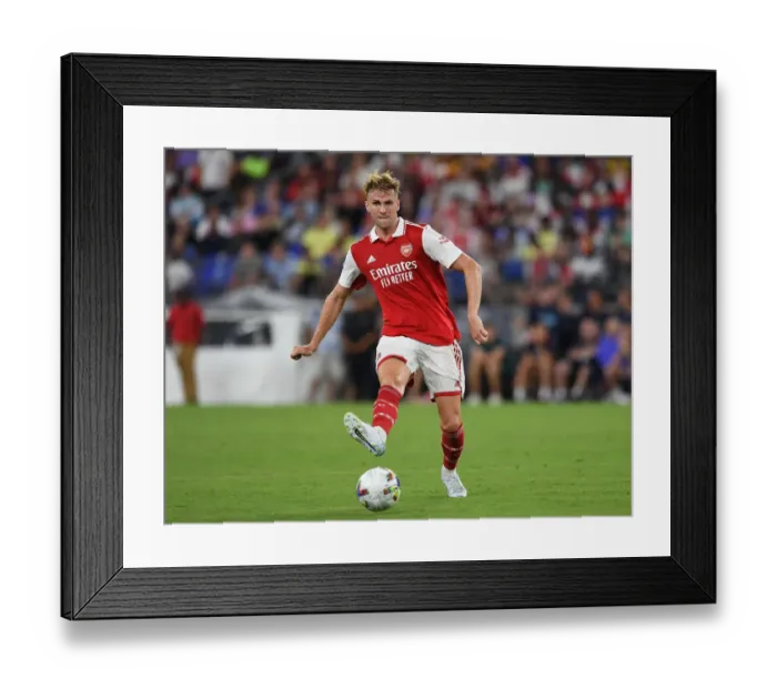 Framed Print : Rob Holding Stands Firm: Arsenal's Defender Braves Pre-Season Clash Against Everton