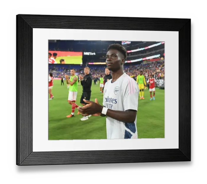 Framed Print : Arsenal's Bukayo Saka Applauds Baltimore Fans after Pre-Season Victory over Everton Framed Print : Arsenal's Bukayo Saka Applauds Baltimore Fans after Pre-Season Victory over Everton