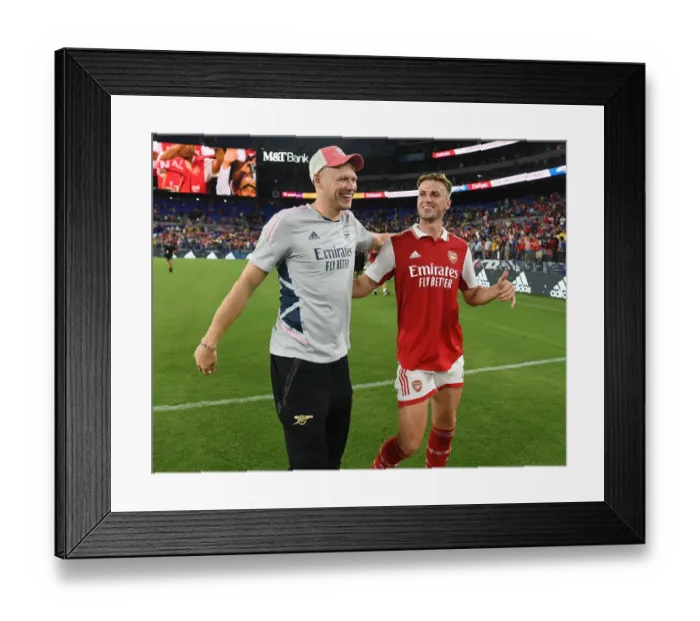 Framed Print : Arsenal's Ramsdale and Holding: A Moment of Relief and Camaraderie Post-Match at M&T Bank Stadium Framed Print : Arsenal's Ramsdale and Holding: A Moment of Relief and Camaraderie Post-Match at M&T Bank Stadium