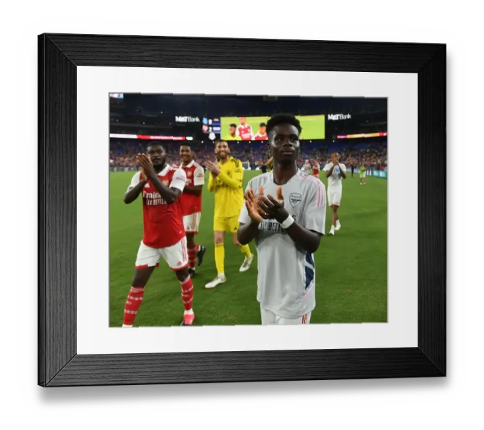 Framed Print : Arsenal's Bukayo Saka Celebrates Pre-Season Victory Over Everton with Baltimore Fans Framed Print : Arsenal's Bukayo Saka Celebrates Pre-Season Victory Over Everton with Baltimore Fans