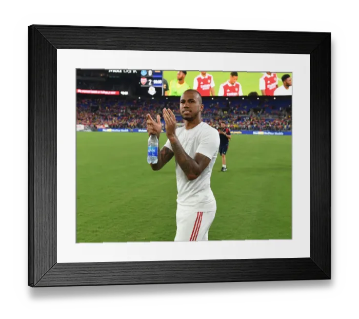 Framed Print : Arsenal Football Club: Gabriel Magalhaes Celebrates with Fans in Baltimore after Pre-Season Match against Everton Framed Print : Arsenal Football Club: Gabriel Magalhaes Celebrates with Fans in Baltimore after Pre-Season Match against Everton