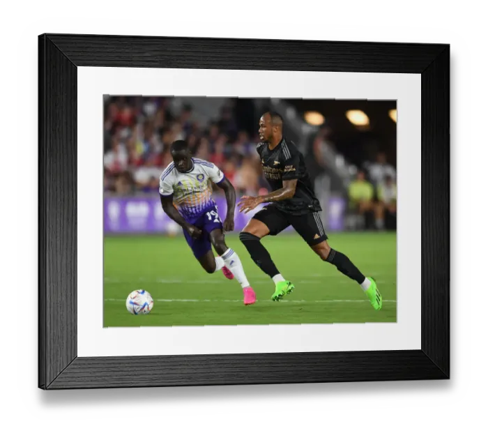 Framed Print : Arsenal vs Orlando City SC: Gabriel Maglhaes in Action at the 2022 Pre-Season Friendly