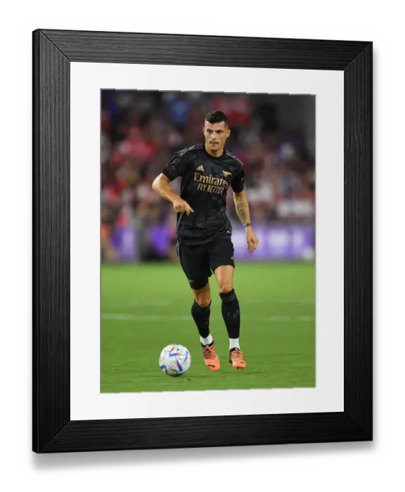 Framed Print : Granit Xhaka in Action: Arsenal's Pre-Season Clash at Orlando City SC Framed Print : Granit Xhaka in Action: Arsenal's Pre-Season Clash at Orlando City SC