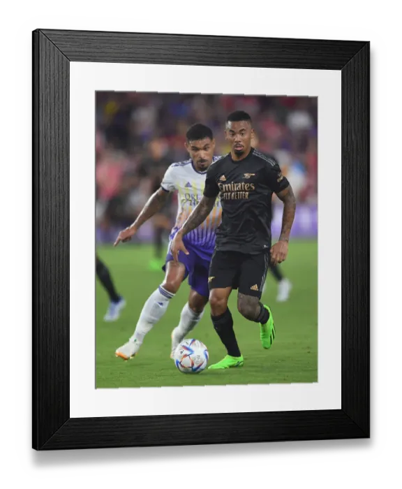 Framed Print : Arsenal's Gabriel Jesus Faces Off Against Orlando City SC's Junior Urso in Pre-Season Clash Framed Print : Arsenal's Gabriel Jesus Faces Off Against Orlando City SC's Junior Urso in Pre-Season Clash