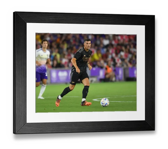 Framed Print : Granit Xhaka in Action: Arsenal's Pre-Season Training with Orlando City SC, July 2022 Framed Print : Granit Xhaka in Action: Arsenal's Pre-Season Training with Orlando City SC, July 2022