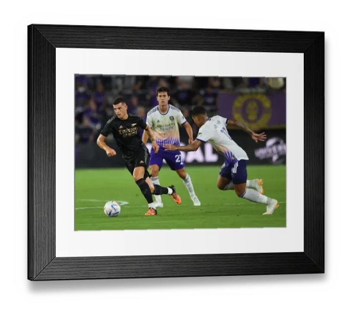 Framed Print : Granit Xhaka in Action: Arsenal's Pre-Season Clash at Orlando City SC (2022-23)